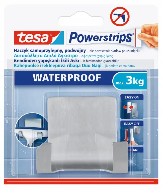 Srebrny metalowy uchwyt Tesa do łazienki prezentowany na tle oryginalnego opakowania waterproof