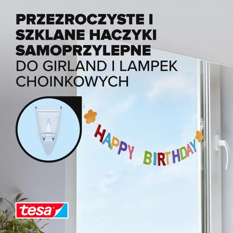 Zestaw przezroczystych haczyków Tesa przyklejonych na oknie utrzymuje kolorowy napis Happy Birthday