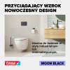 Czarny uchwyt Tesa MOON BLACK zamontowany obok toalety w nowoczesnej, jasnej łazience